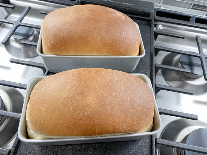https://www.foodstoragemoms.com/wp-content/uploads/2023/03/Homemade-Bread-On-The-Stove-Cooling.jpeg